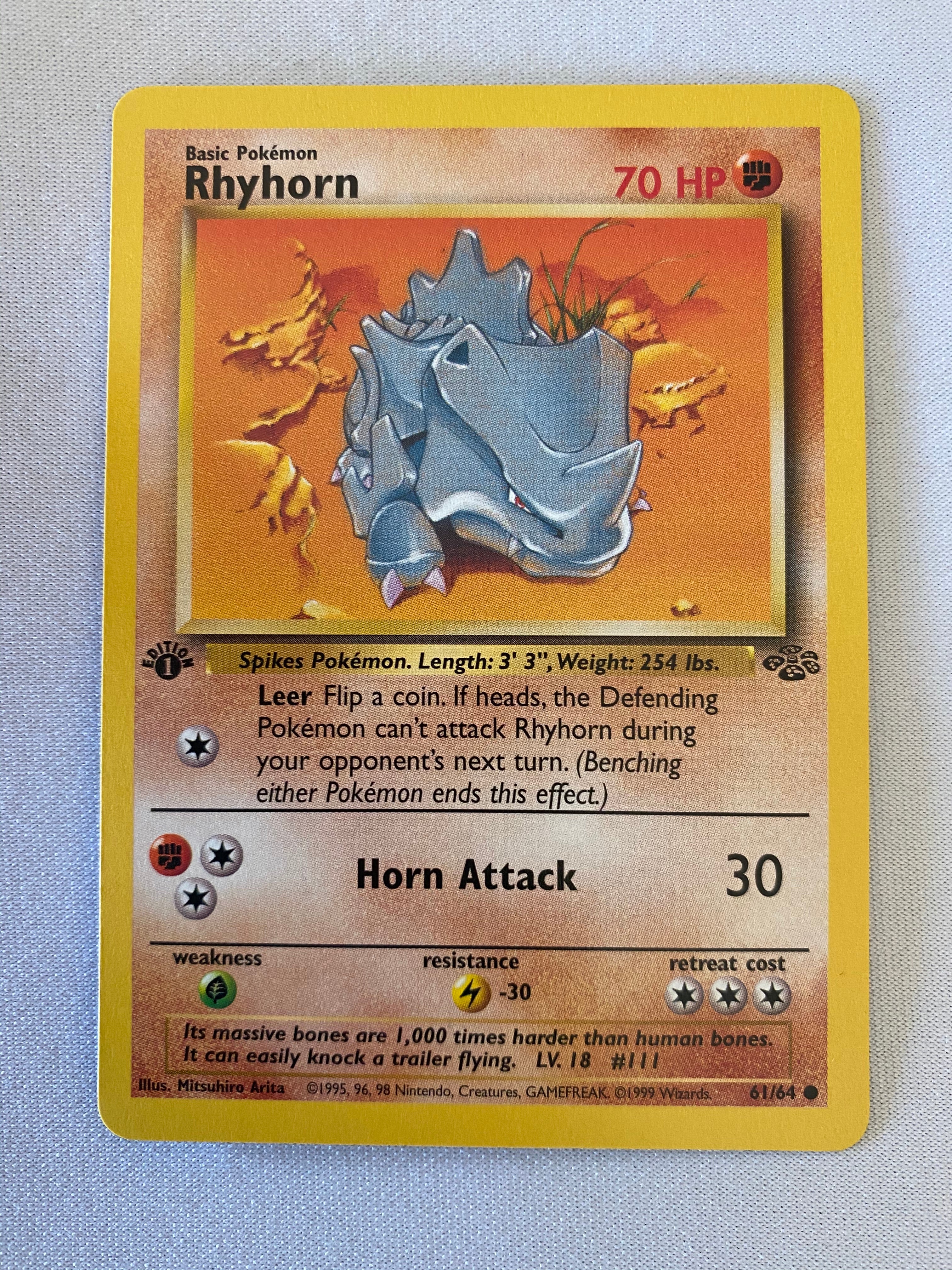 Rhyhorn 61/64 1st Edition Common Pokemon Card Near Mint