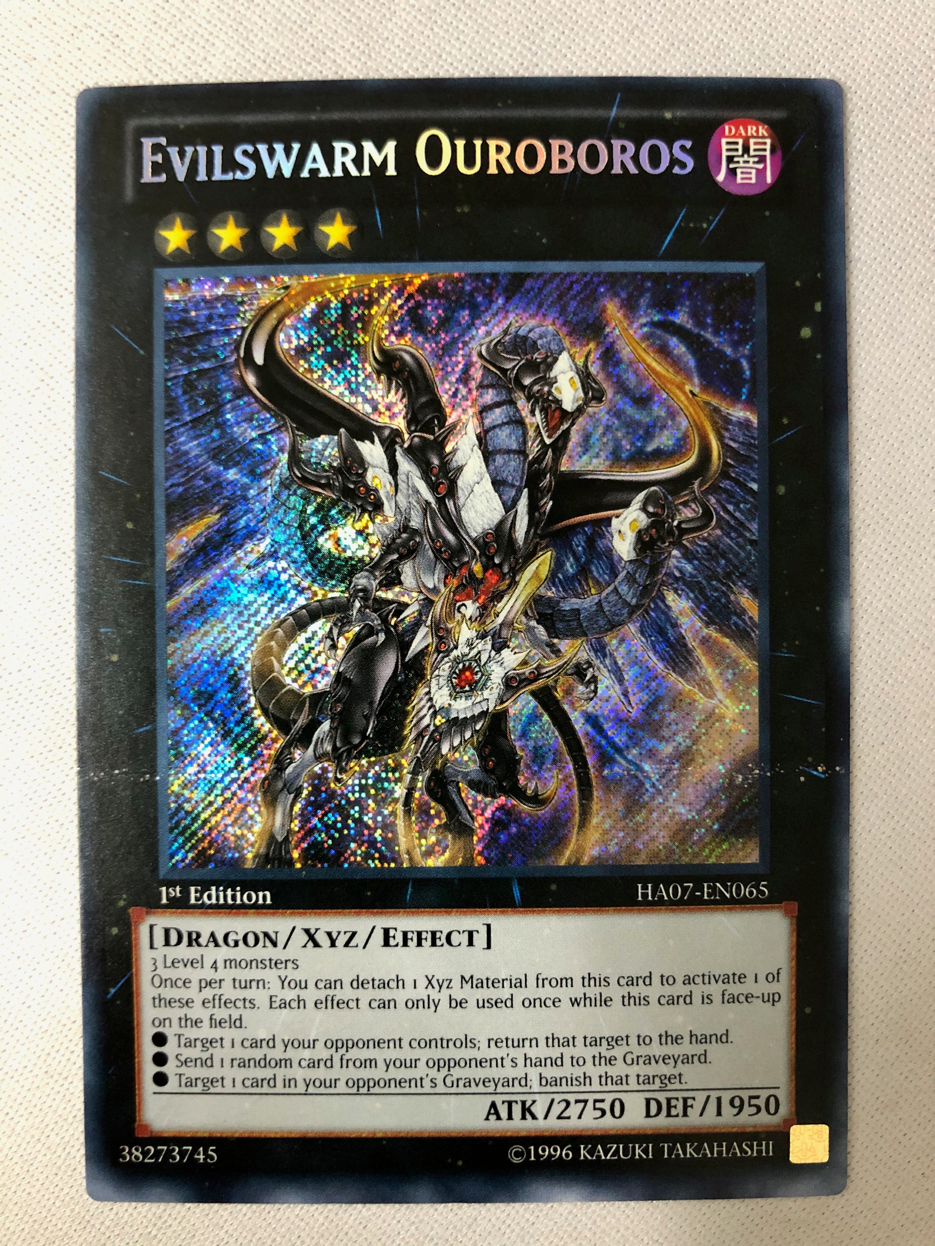 yugioh evilswarm cards Yugioh Evilswarm Ouroboros HA07-EN065 Secret Rare 1st Edition NM