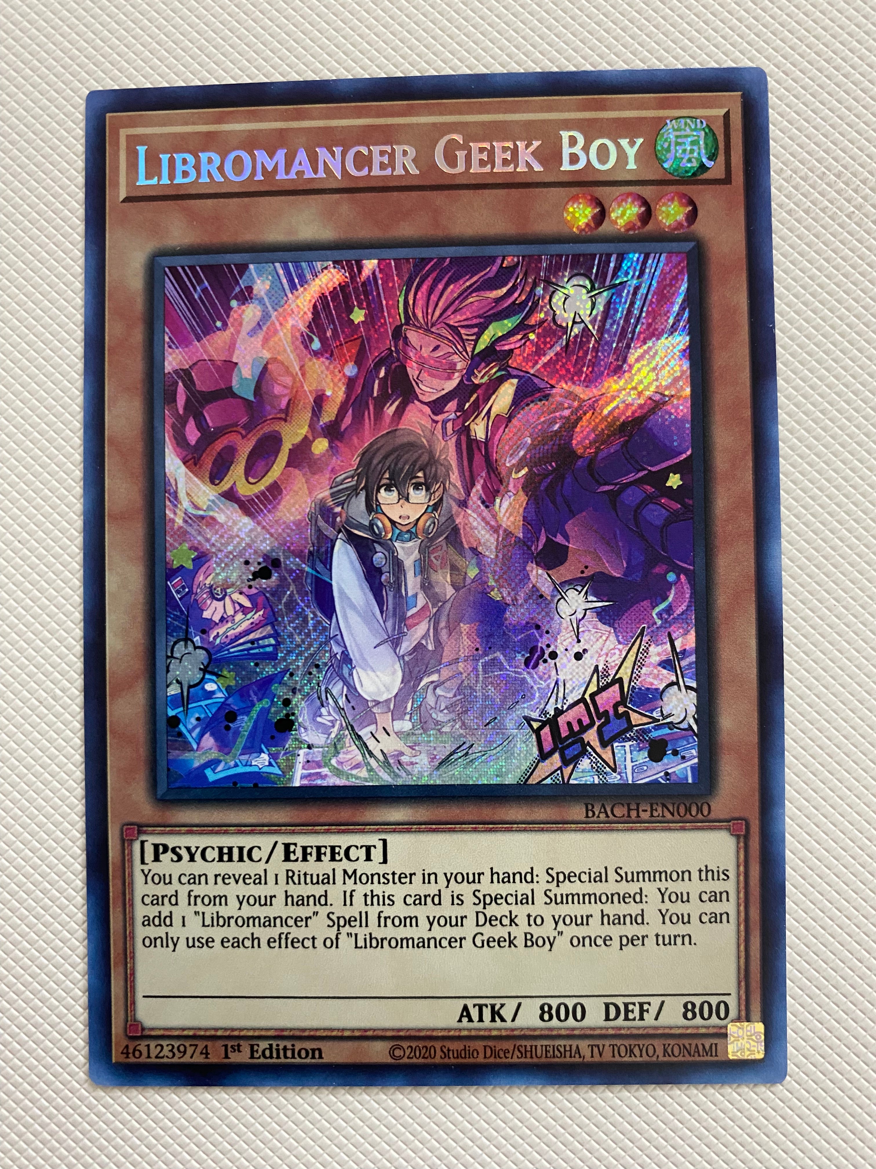 Yugioh Libromancer Geek Boy BACH-EN000 Secret Rare 1st Edition Naer Mi