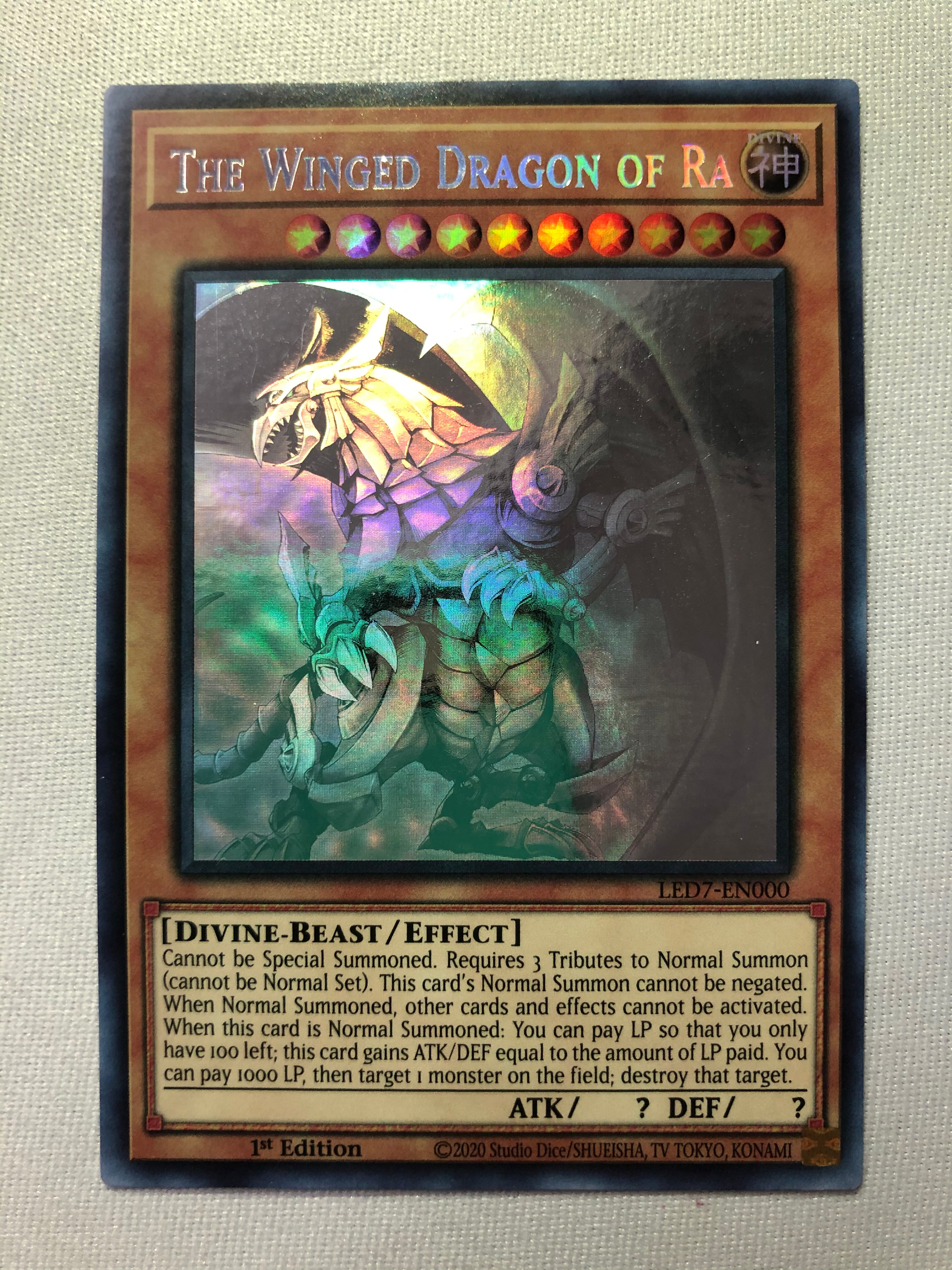 Yugioh The Winged Dragon of Ra Ghost Rare LED7-EN000 1st