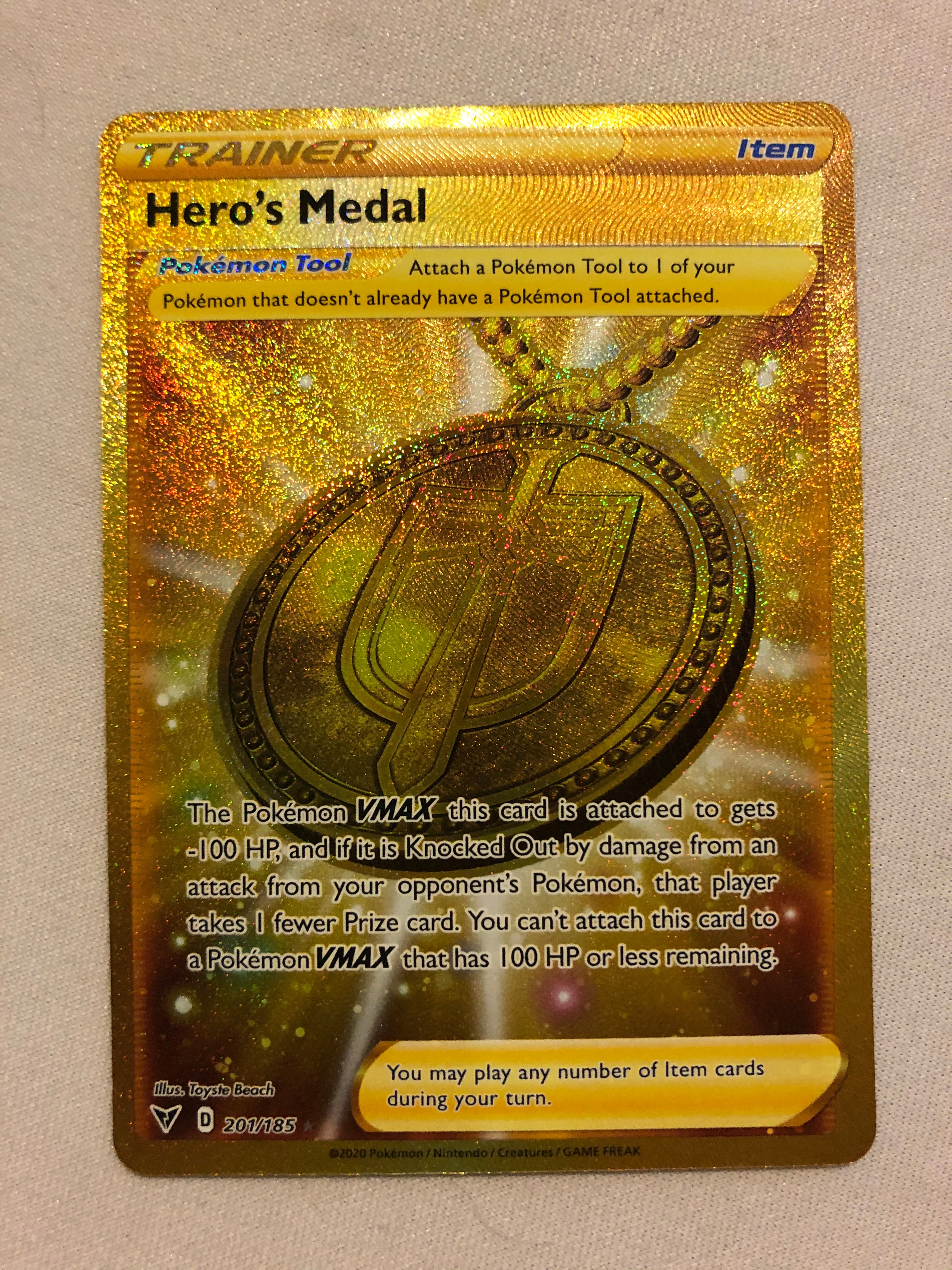 Hero's Medal 201/185 Secret Rare Full Art Vivid Voltage Pokemon Card N