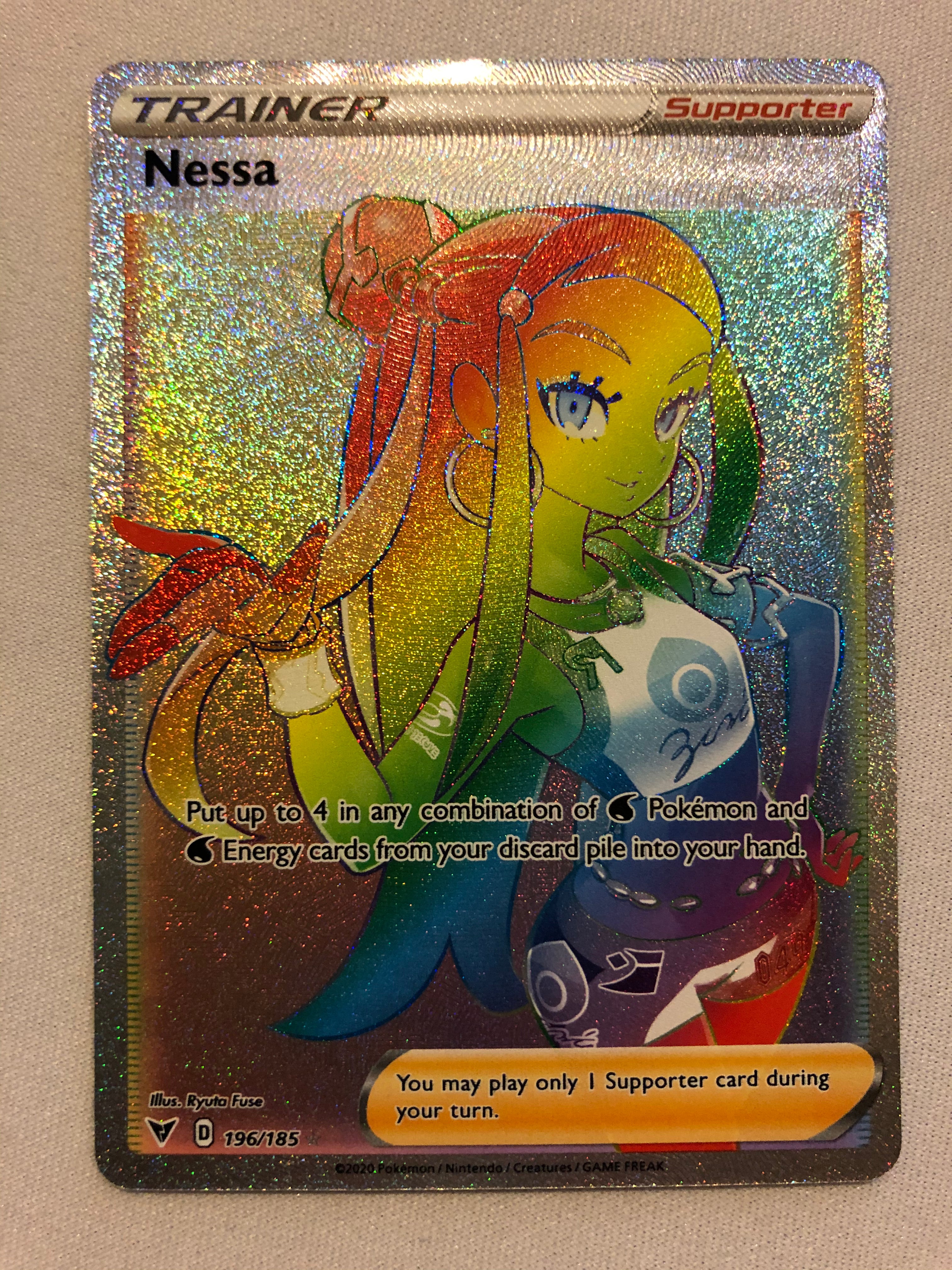 Nessa 196/185 Rainbow Secret Rare Holo Vivid Voltage Pokemon Card Near Mint Nessa 196/185 Rainbow Secret Rare Holo Vivid Voltage Pokemon Card Near Mint