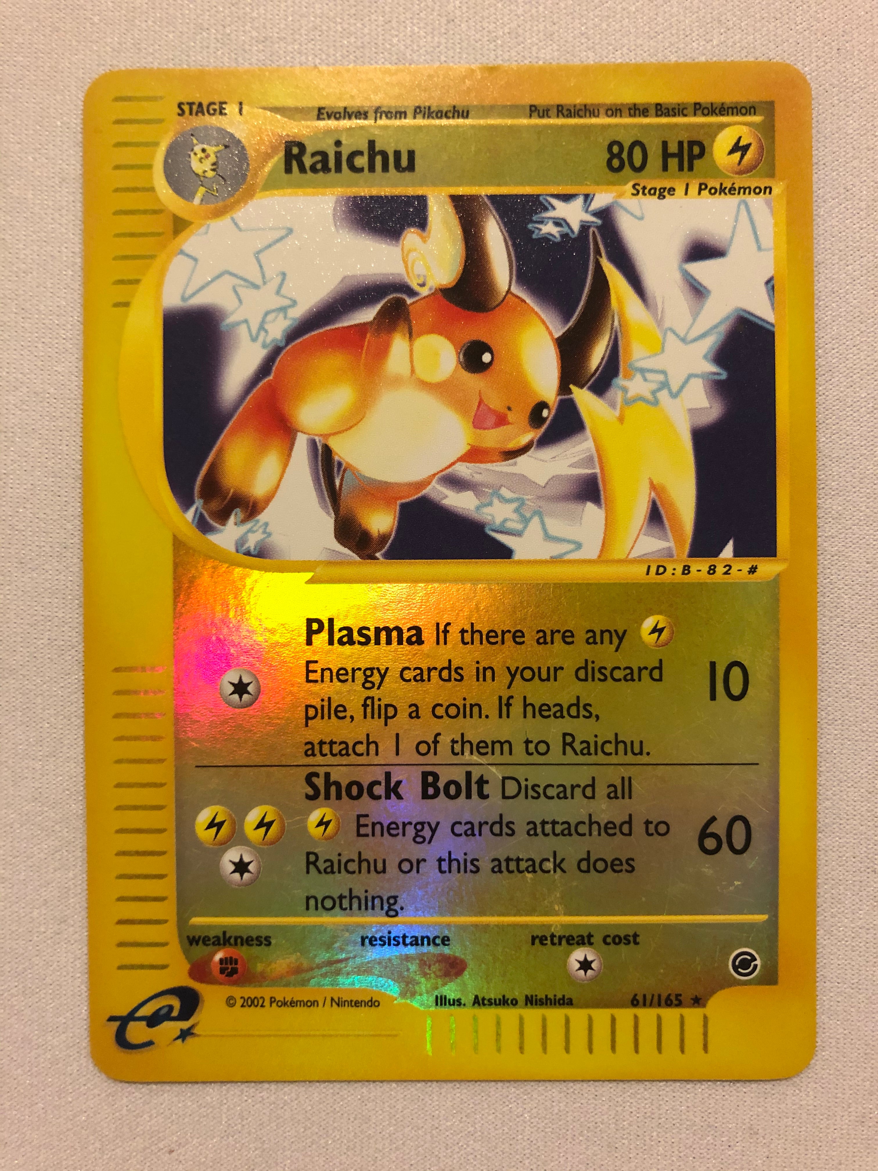 pikachu expedition pokemon card Raichu 61/165 Reverse Holo Rare Expedition Base Set Pokemon Card Near