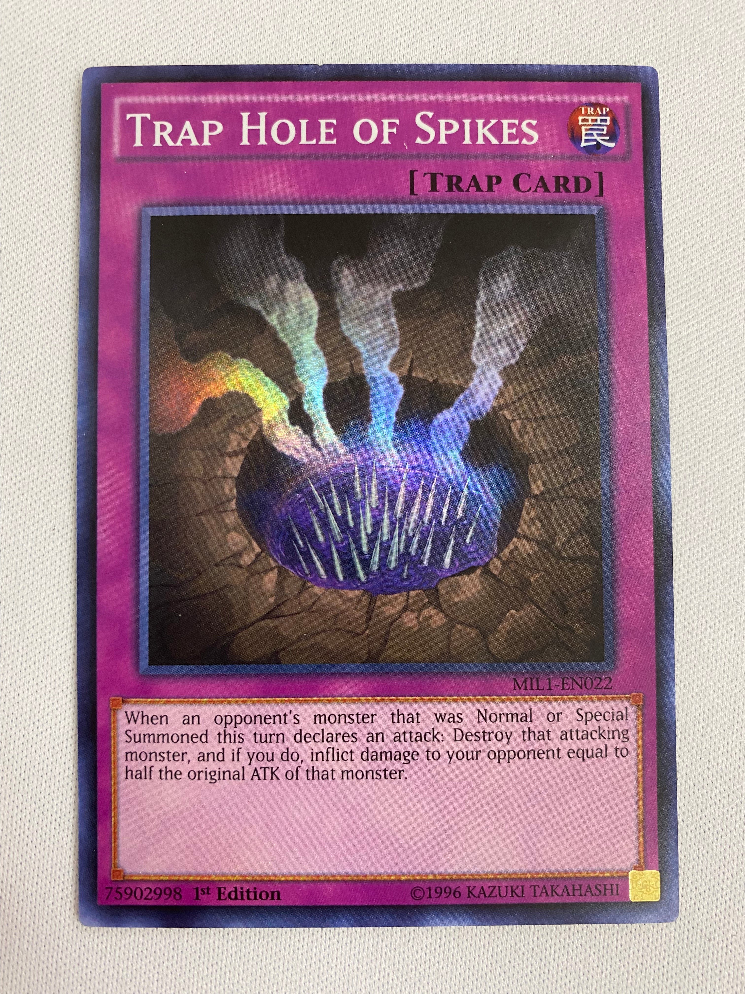 Yugioh Trap Card Trap Hole of Spikes MIL1-EN022 1st Edition Super Rare