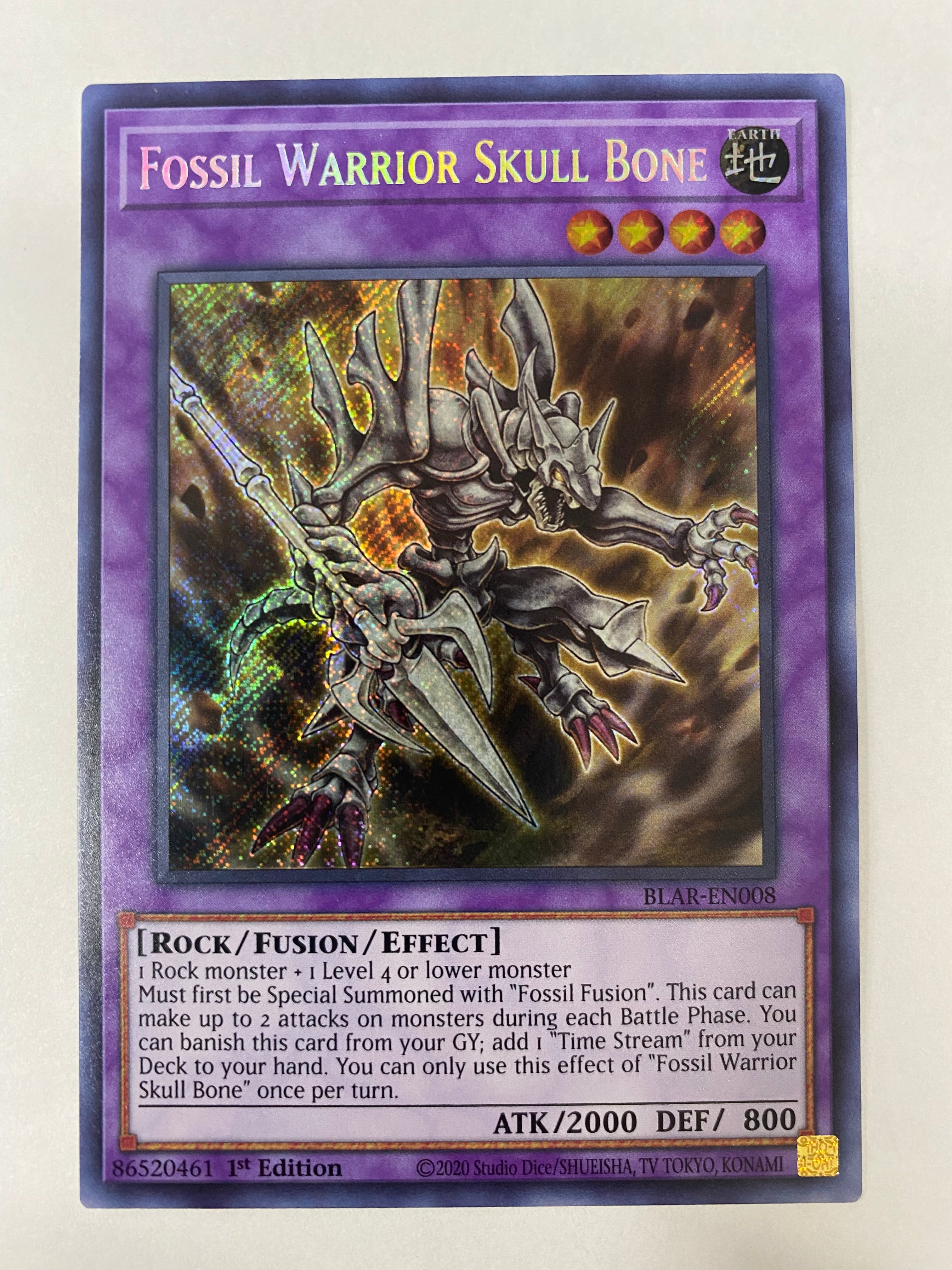 Yugioh Fossil Warrior Skull Bone - BLAR-EN008 Secret Rare 1st Edition Yugioh Fossil Warrior Skull Bone - BLAR-EN008 Secret Rare 1st Edition