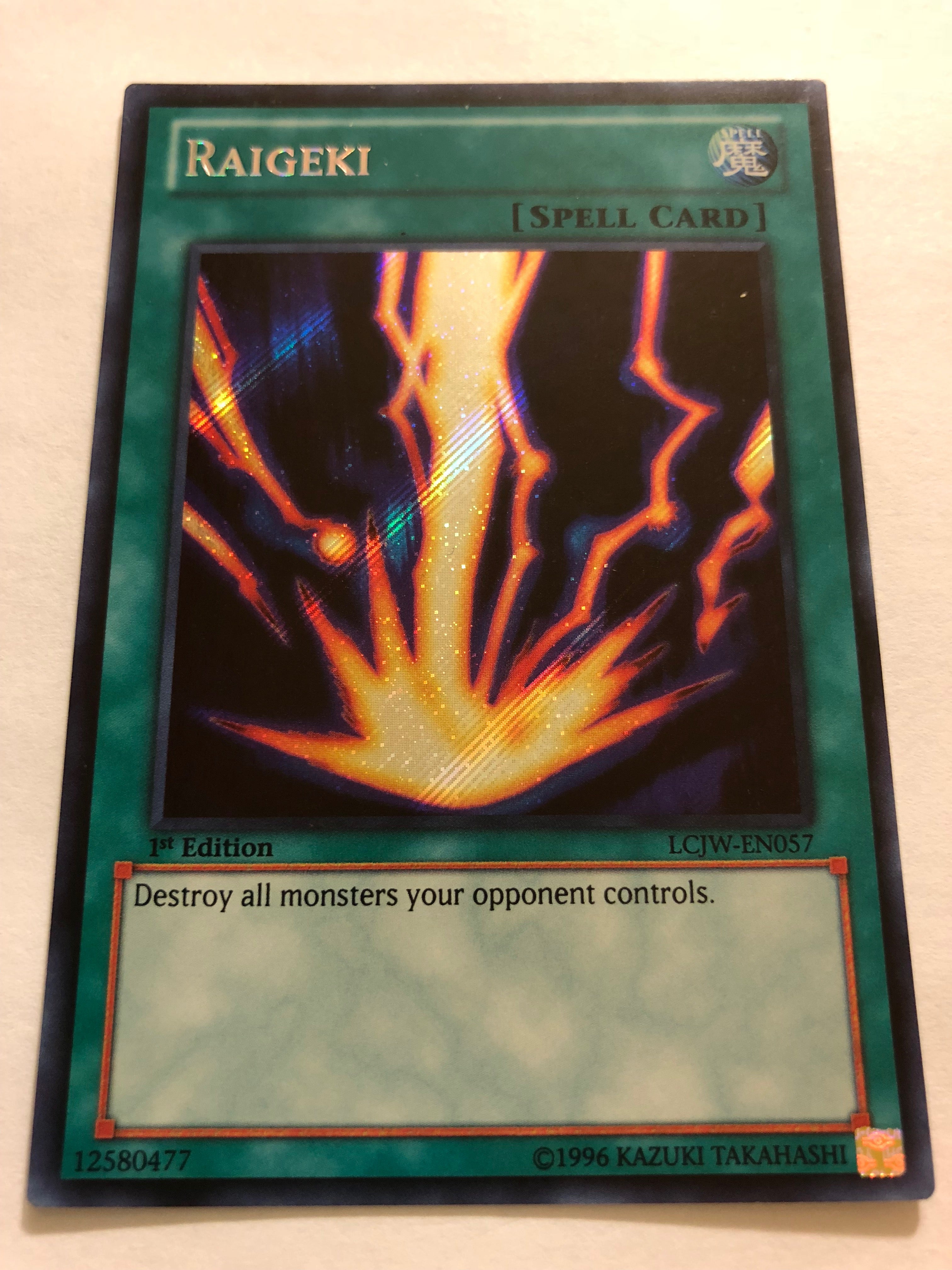 Yugioh Raigeki LCJW-EN057 Secret Rare 1st Edition Near Mint Yugioh Raigeki LCJW-EN057 Secret Rare 1st Edition Near Mint