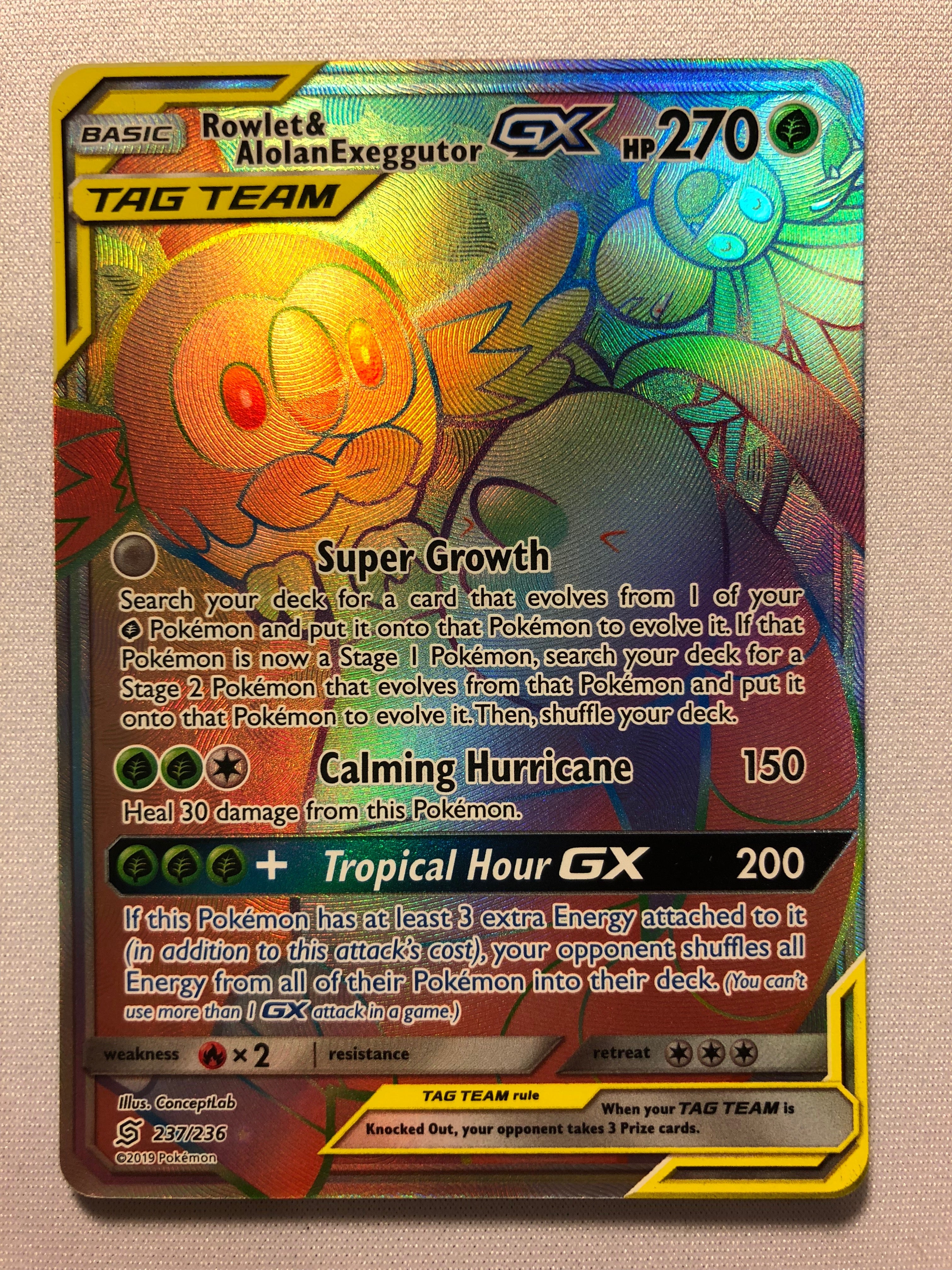 Rowlet & Alolan Exeggutor GX 237/236 Rainbow Secret Rare Pokemon Card Rowlet & Alolan Exeggutor GX 237/236 Rainbow Secret Rare Pokemon Card