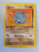 Rhyhorn 61/64  1st Edition Common Pokemon Card Near Mint