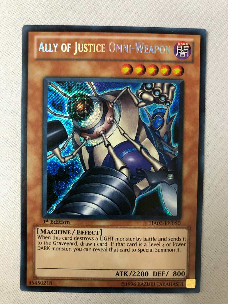 Yugioh Ally of Justice Omni-Weapon HA03-EN050 Secret Rare 1st Edition NM