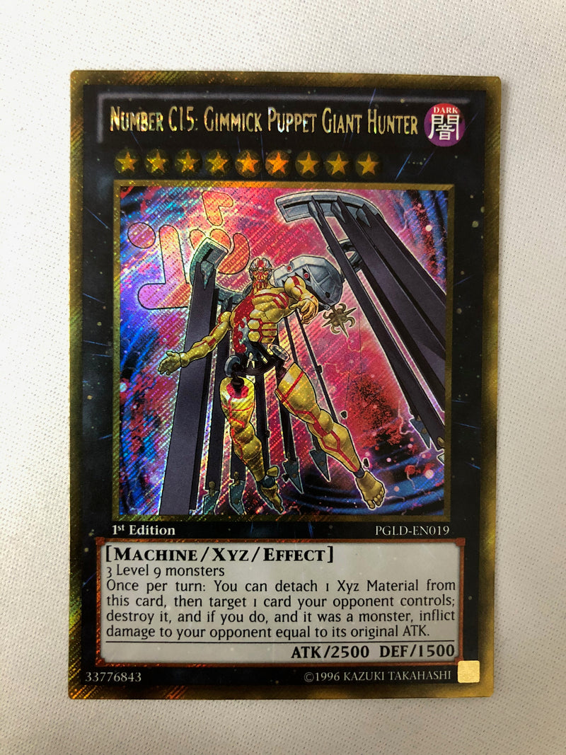 Yugioh Number C15: Gimmick Puppet Giant Hunter PGLD-EN019 Gold Secret Rare 1st Edition NM