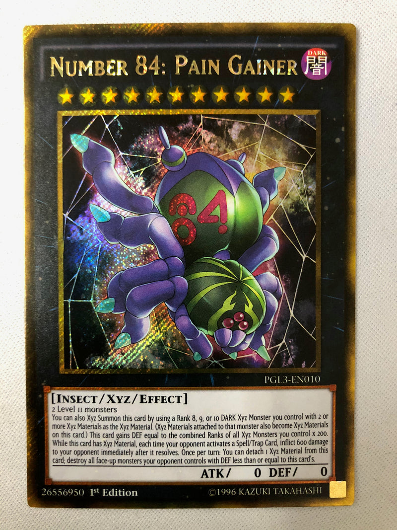 Yugioh Number 84: Pain Gainer PGL3-EN010 Gold Secret 1st Edition NM
