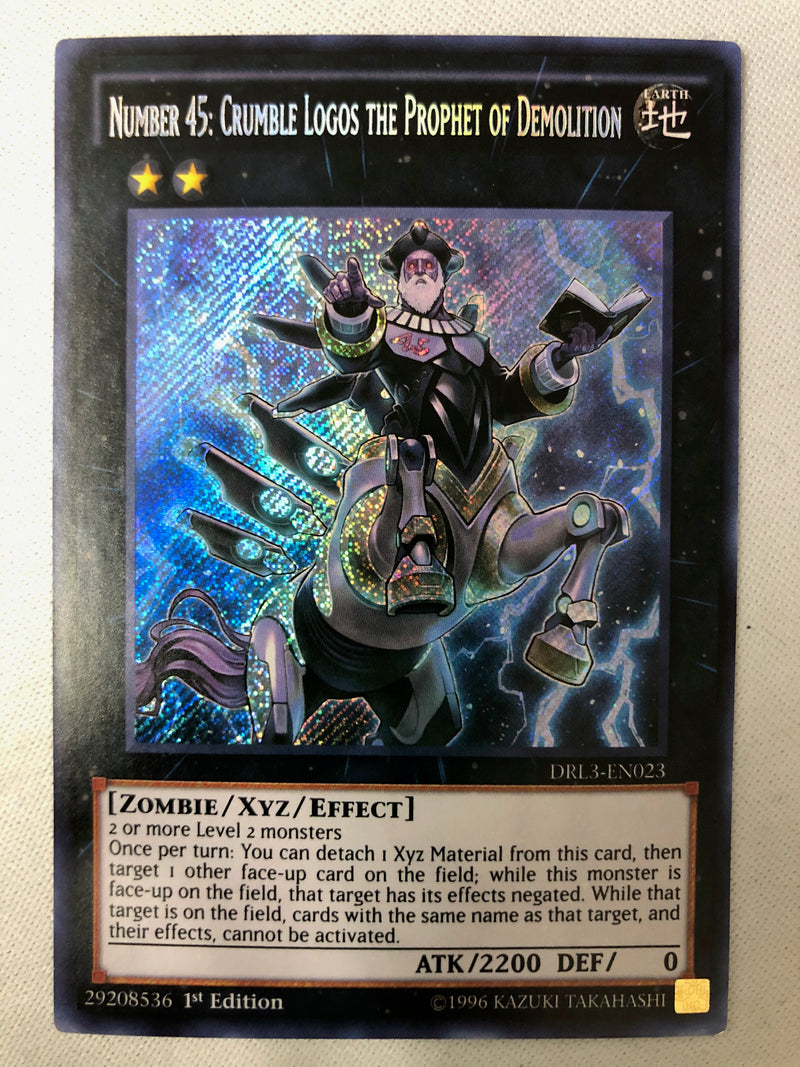 Yugioh Number 45: Crumble Logos The Prophet Of Demolition DRL3-EN023 1st Edition Secret Rare NM