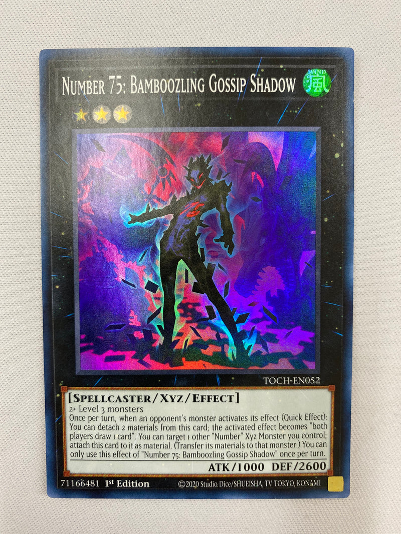 Yugioh Number 75: Bamboozling Gossip Shadow TOCH-EN052 Super Rare 1st NM