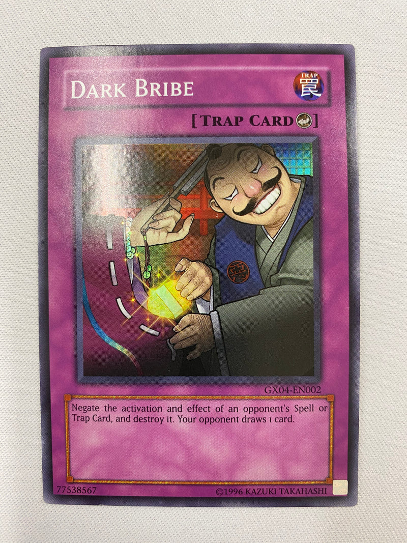 Yugioh Dark Bribe GX04-EN002 Super Rare Unlimited Edition NM