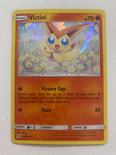 Victini 26/236  Unified Minds Holo Rare Pokemon Card Naer Mint