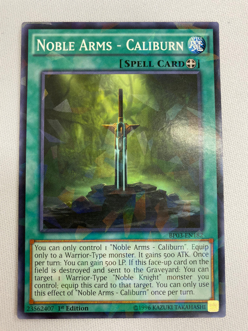 Yugioh Noble Arms Caliburn  BP03-EN182  Shatterfoil  1st Edition NM