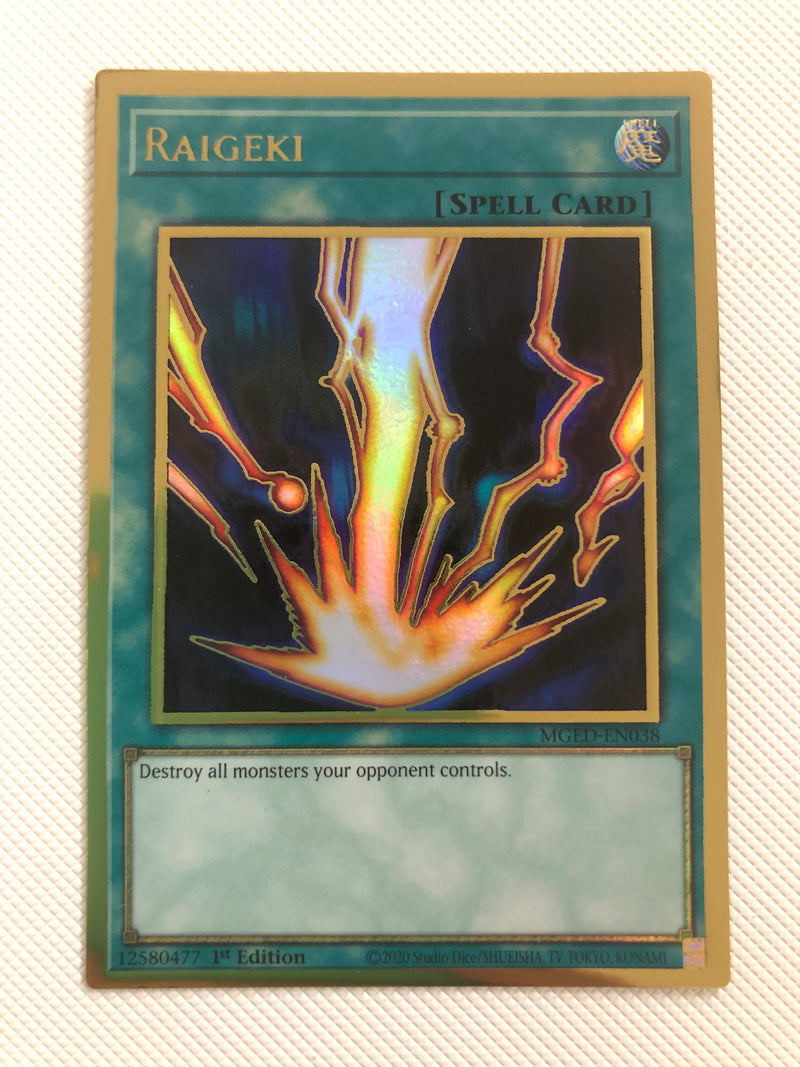 Yugioh Raigeki MGED-EN038 1st Edition Premium Gold Rare Near Mint
