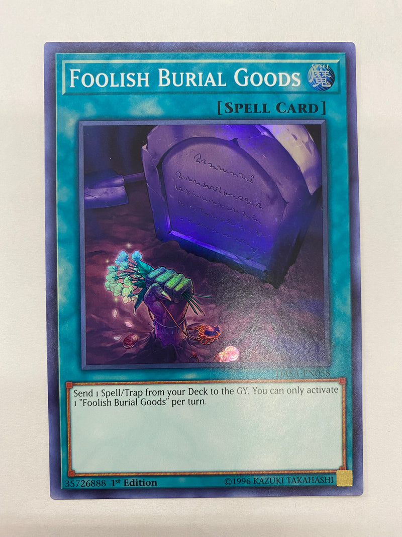 Yugioh Foolish Burial Goods  DASA-EN058  Super Rare 1st Edition NM