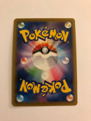 Brock's Grit 100/087 SR 20th Anniversary Holo Pokemon Card Mint/Near Mint