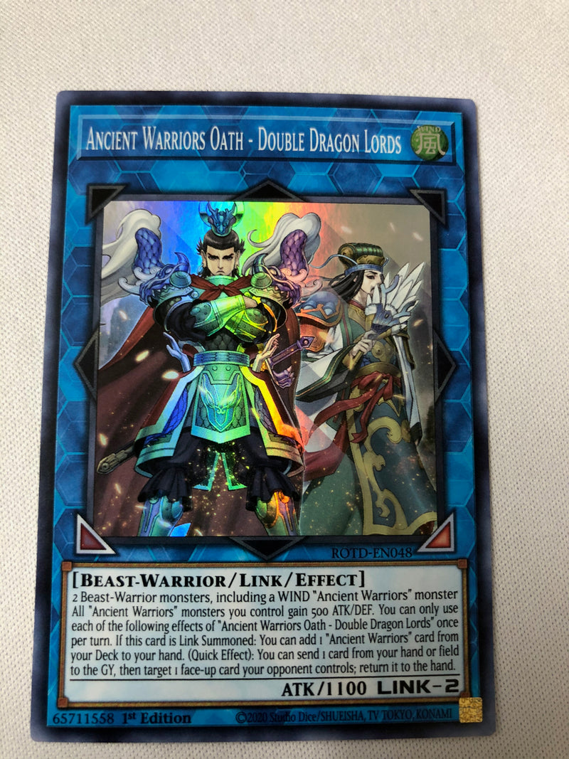 Yugioh Ancient Warriors Oath - Double Dragon Lords ROTD-EN048 NM Super Rare 1st Edition