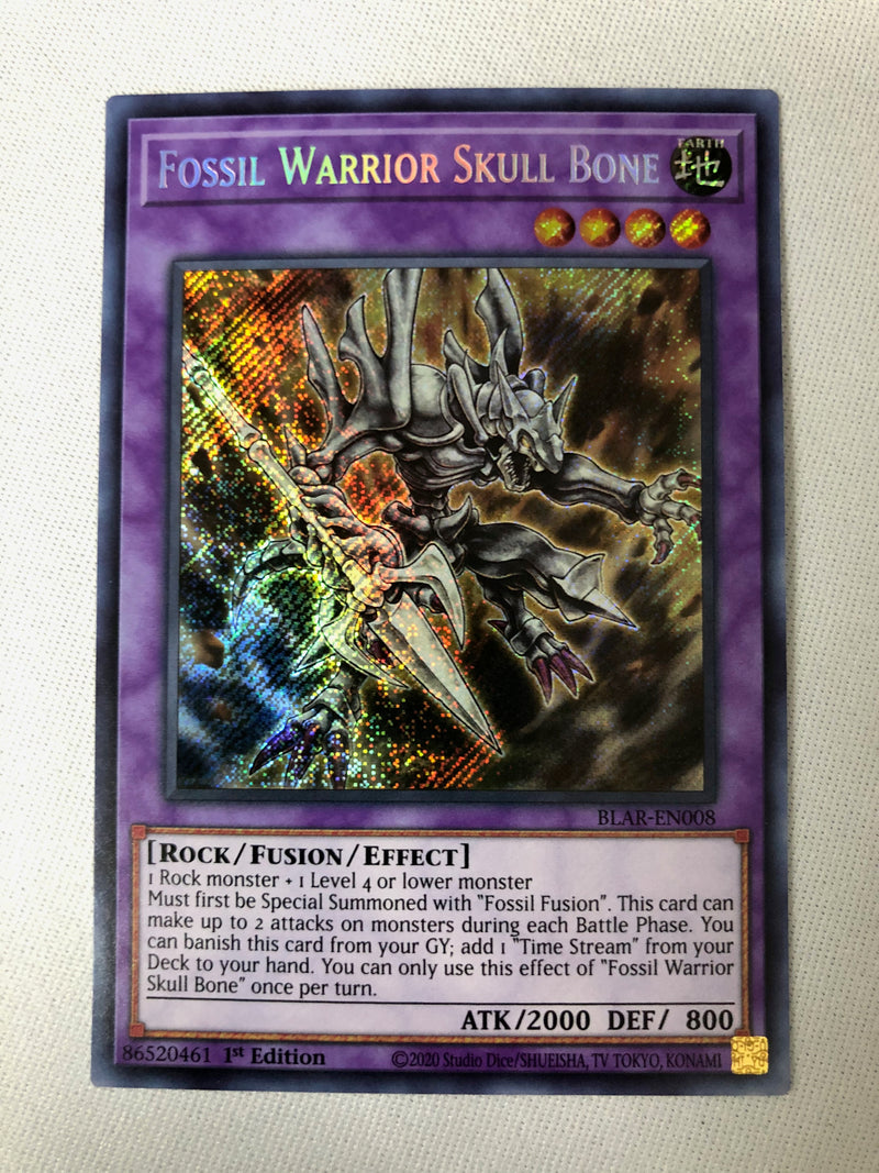 Yugioh Fossil Warrior Skull Bone BLAR-EN010 Secret Rare 1st Edition Near Mint