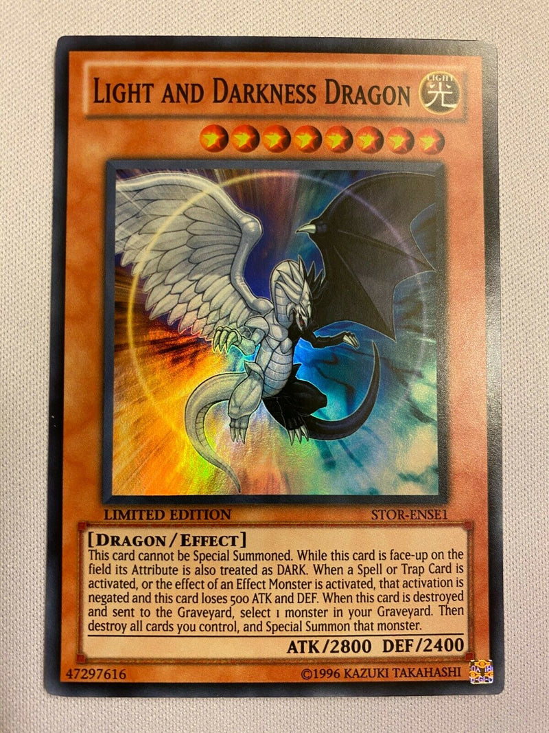 yugioh light dragon cards Yugioh Light and Darkness Dragon STOR-ENSE1 Limited Edition Super Rare